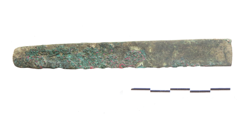 Early Eneolithic copper chisel found in structure 2/16 at Velika humska ćuka (© A. Bulatović)